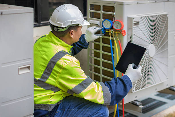 Professional Hvac Maintenance technician working in Crownsville, MD